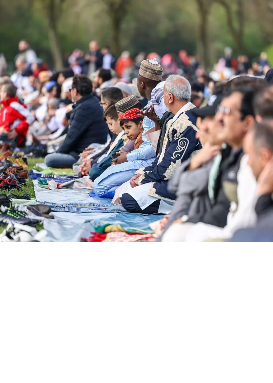 Families gathered outdoors for Eid prayer